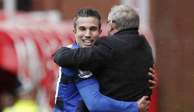 Van Persie celebrates his goal with his manager Sir Alex Ferguson