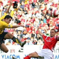 Wondergoal by Robin van Persie during the second half of this football match. Its Arsenal VS Charlton. Van Persie is one of the best Dutch players playing in the English competition for Arsenal. In this clip Van Persie shoots a ball out of the air straight into the goal. A great shot and beautiful goal!