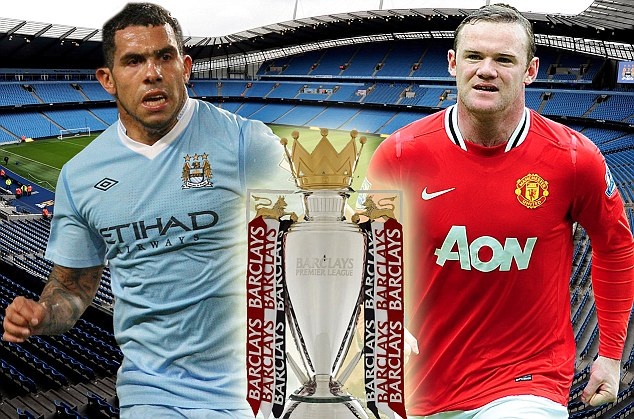 Manchester City's Carlos Tevez and Manchester United's Wayne Rooney  square off