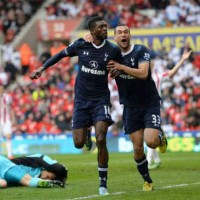 Adebayor celebrates his goal as he puts Tottenham in the safe zone