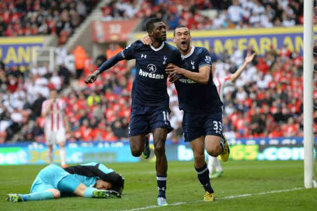 Adebayor celebrates his goal as he puts Tottenham in the safe zone