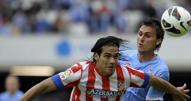 Atletico Madrid scored twice in the second half to hand relegation battlers Celta Vigo a potentially crushing 3-1 loss.