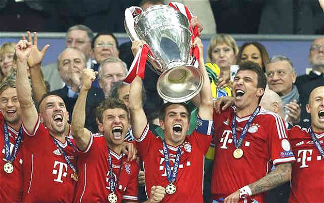 Bayern Munich celebrate their title of the Champions League trophy