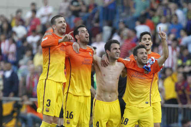 FC Barcelona players celebrate their victory against Atletico Madrid
