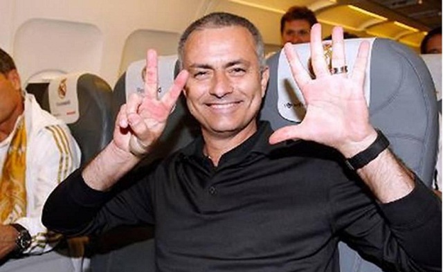 Jose Mourinho looks like he is rejoicing at the defeat of Barcelona against Bayern Munich , a 7-0 loss on aggregate that he mocks by showing seven fingers