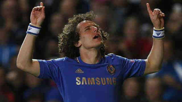 Luiz scoring celebrating his goal as he scores a stunning goal