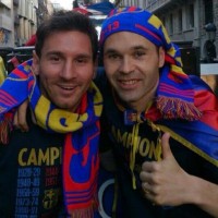 Messi and Iniesta celebrating the title-Lionel Messi will be injured for 2-3 weeks says FC Barcelona official website