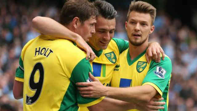 Norwich City celebrate their goal against Manchester City