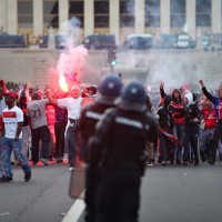 Paris Saint-Germain's celebration of its first French league 1 title since 1994 is marred by clashes between riot police and fans in the shadow of the Eiffel Tower.