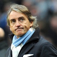 United’s Sir Alex Ferguson gets a guard of honour while City’s Roberto Mancini is sacked