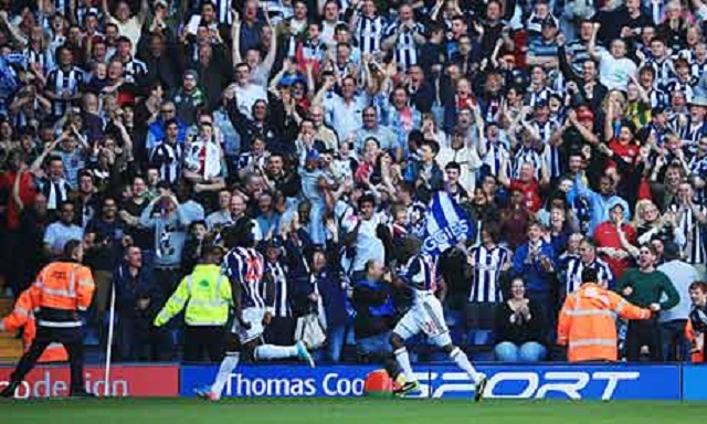 Romelu Lukaku runs to celebrate with West Brom fans after completing his hat-trick in Albion's thrilling 5-5 draw with Manchester United. 