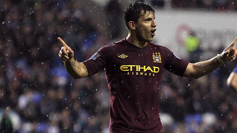 Sergio Aguero and Edin Dzeko scored as Man City eased past Reading under the guidance of caretaker boss Brian Kidd.