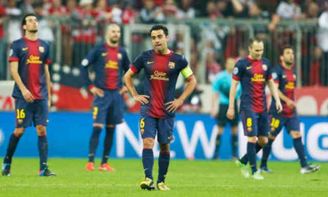 Xavi and his team mates couldn't believe with the result and being kicked out of the Champions League