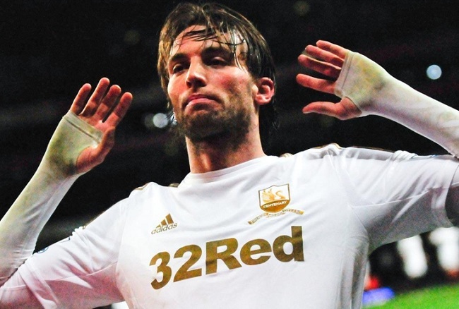 Swansea's Spanish star Michu celebrates