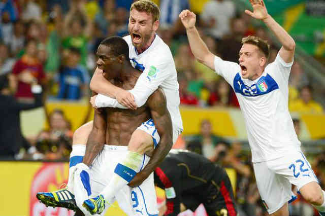 Mario Balotelli celebrates his goal that brought Italy their victory