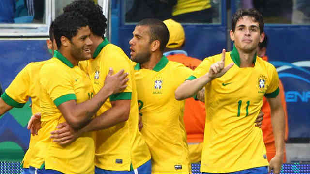 Oscar celebrates his goal with Brazil