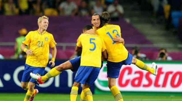 Zlatan celebrates with his team mates with his goal