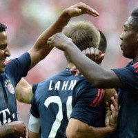 Lahm celebrates his goal with his team mates