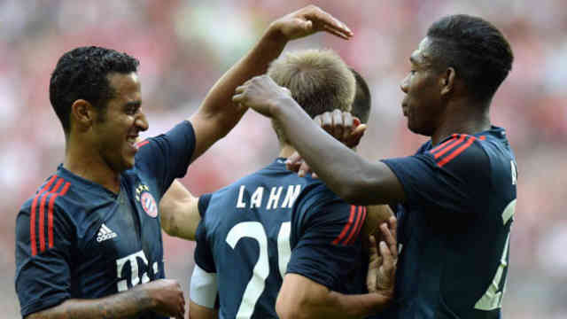 Lahm celebrates his goal with his team mates