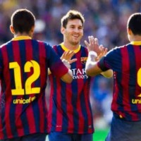 Messi celebrates with his team with scoring a goal