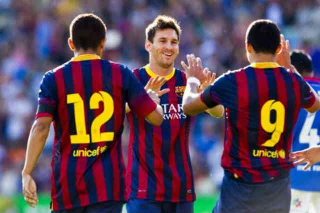 Messi celebrates with his team with scoring a goal