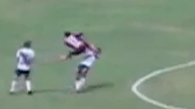 Peruvian player takes kung-fu kick to the face