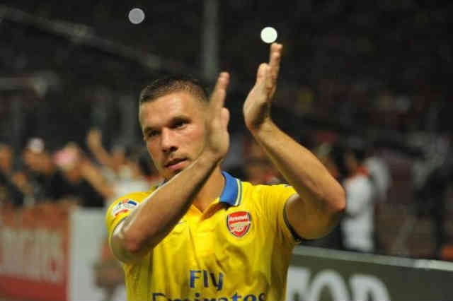 Podolski celebrates his match in Indonesia