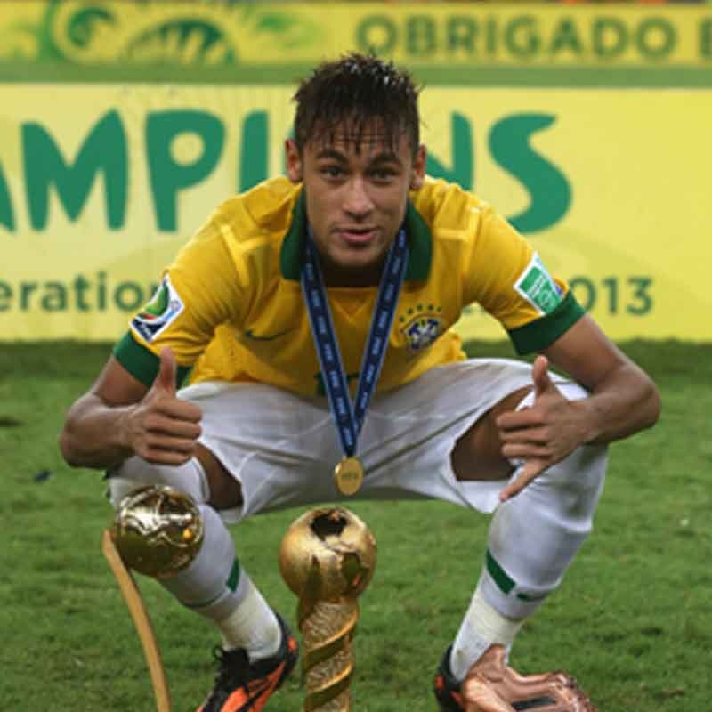 Neymar celebrates the Confederations Cup and the Golden Ball as the tournament's top player