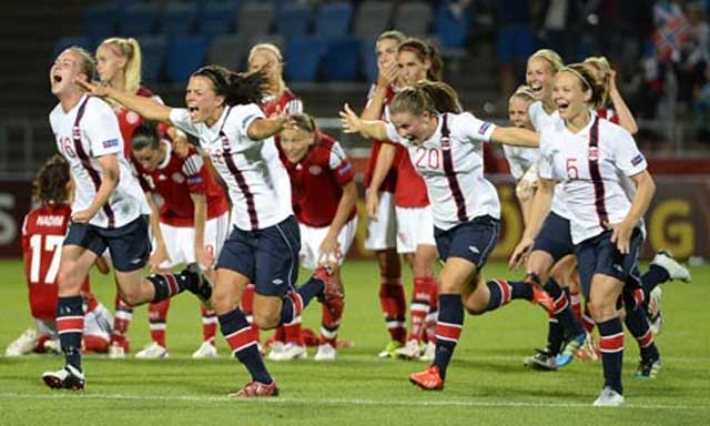 Norway's womens football team celbrate after beating Denmark in the Euro 2013 semi-final on penalty shootout