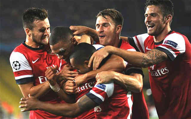 Arsenal celebrate their victory at the play off of the Champions League Qualifications