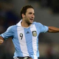 Higuain celebrate his smashing goal against Italy