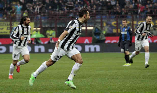 Juventus celebrate their late goal but still lose their match against Inter Milan