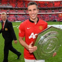 Robin Van Persie celebrates his victory with Manchester United