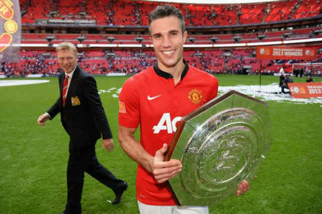 Robin Van Persie celebrates his victory with Manchester United