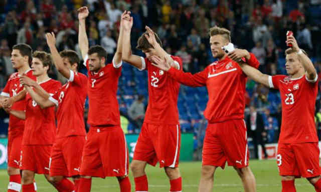 The Swiss celebrate their victory against the world class Brazil