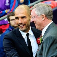 Management greats Pep Guardiola and Sir Alex Ferguson share a handshake