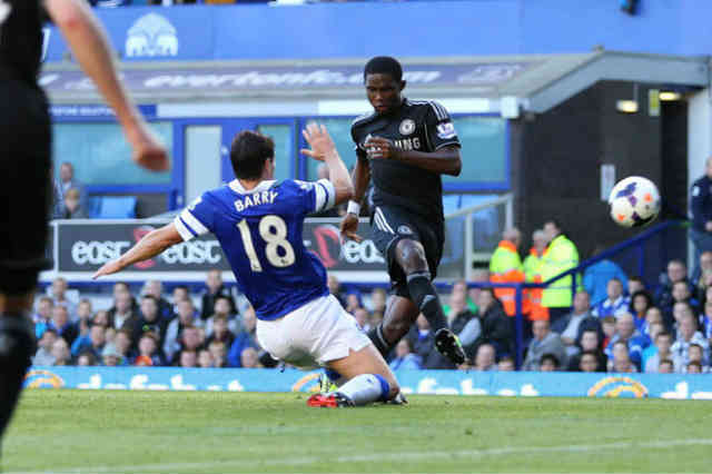Barry defends against Eto's goal at the Everton stadium