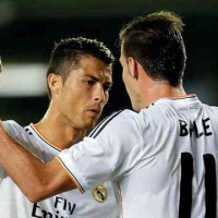 Ronaldo celebrates his goal with new team mate, Gareth Bale