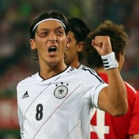 German Superstar Mesuit Ozil celebrates