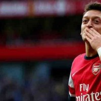Ozil celebrates his goal with the Gunners