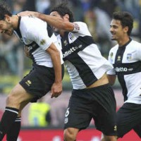 Parma celebrate their win against AC Milan