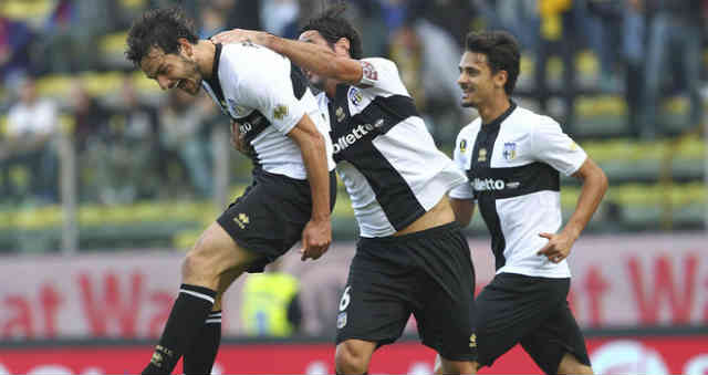 Parma celebrate their win against AC Milan