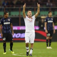 Totti celebrates his smashing goal against Inter Milan