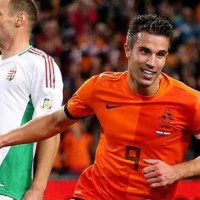 Van Persie celebrates and Holland qualify to the World Cup