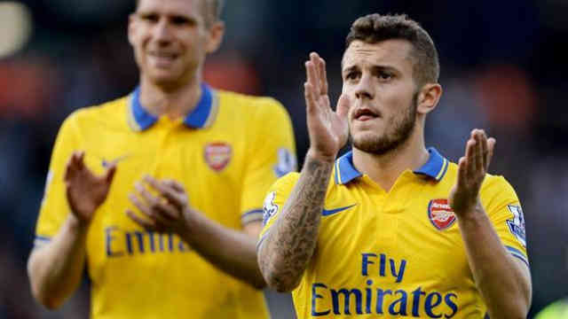 Wilshere celebrates the game as he give Arsenal hope for a draw