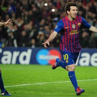 Lionel Messi once again celebrates his two goals against AC Milan in the Champions League