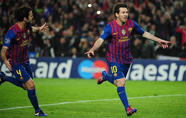 Lionel Messi once again celebrates his two goals against AC Milan in the Champions League