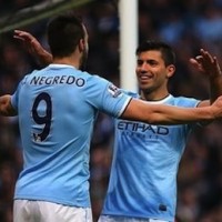 Alvaro Negredo and Sergio Aguero celebrate another goal