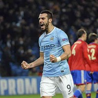 Negredo celebrates his hat trick against Moscow