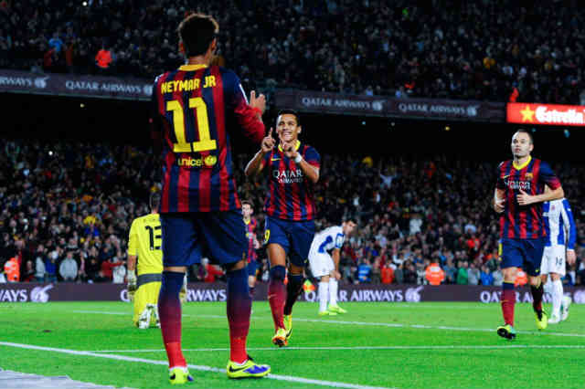 Sanchez celebrates with his team mate Neymar